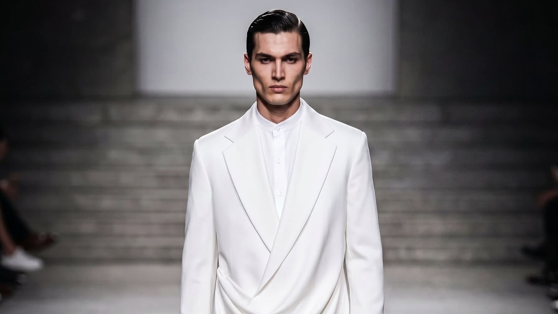 A menswear look photographed against a plain backdrop, credited to designer Zaid Farouki